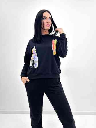 Женский костюм-двойка с капюшоном 