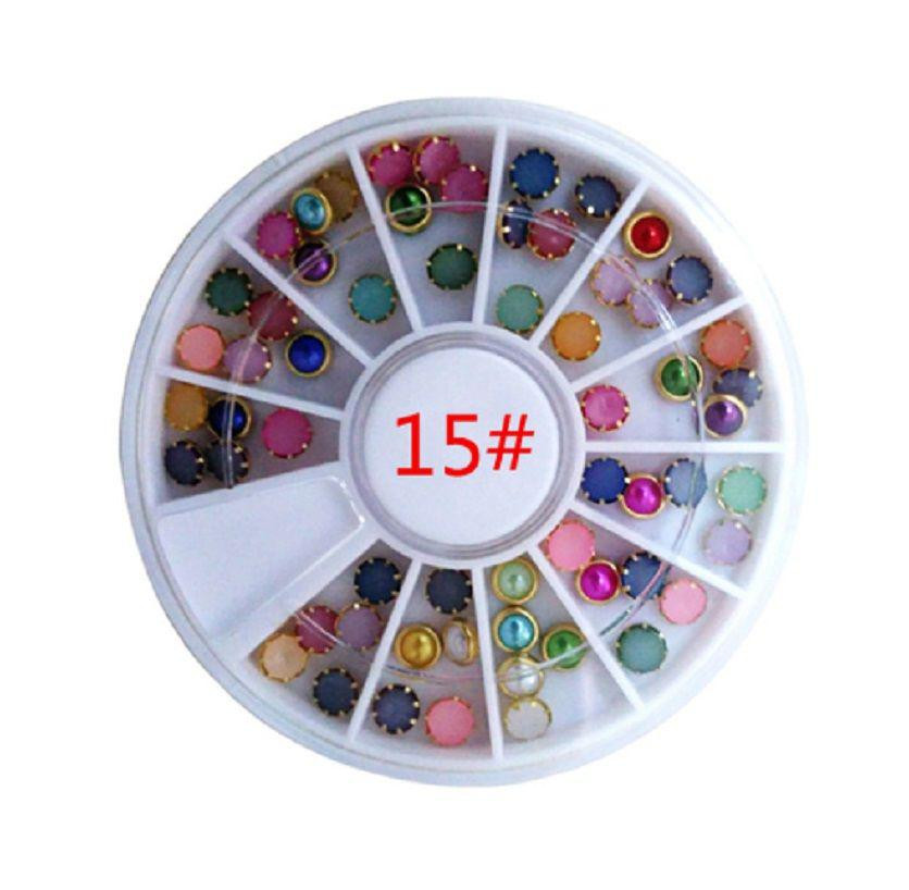 Різнокольорові стрази на нігті Київ - фото 1