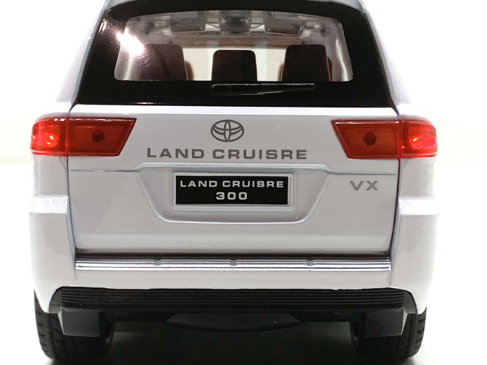 Машина Автосвіт Toyota Land Cruiser 30 інерційна відчиняються двері капот багажник 20см Білий (AP-2033) Чернігів - фото 8