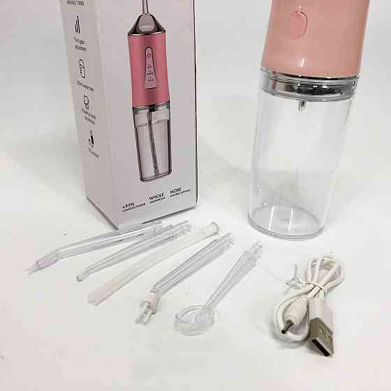 Ирригатор для чистки зубов и полости рта Oral Irrigator с аккумулятором и сменными насадками. Цвет: розовый UZ-30 Львов