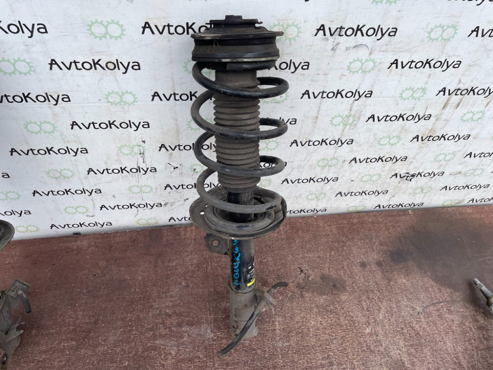 Амортизатор передній лівий (стійка) Nissan Qashqai 2007-2013 (54303BR00B) Ковель - фото 2