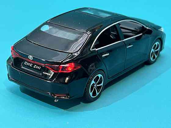Машинка металева Авто Експерт Toyota Corolla 1:32 метал світло/звук Чорна (GT-6258) Чернігів