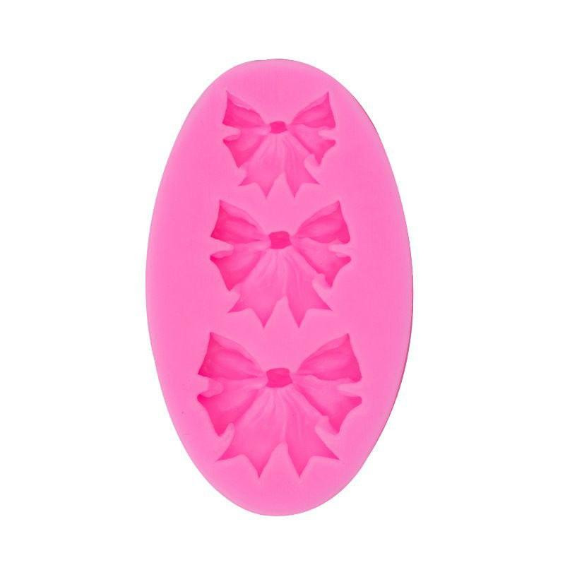 Молд силіконовий Бантики 50 на 85 мм рожевий Київ - фото 5