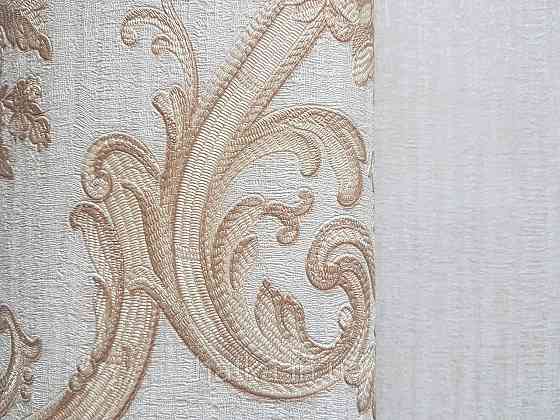 Шпалери вінілові на флізеліні AdaWall Seyyah 1.06х10 квіти в горщику вензеля структурні золотисті на бежевому Київ