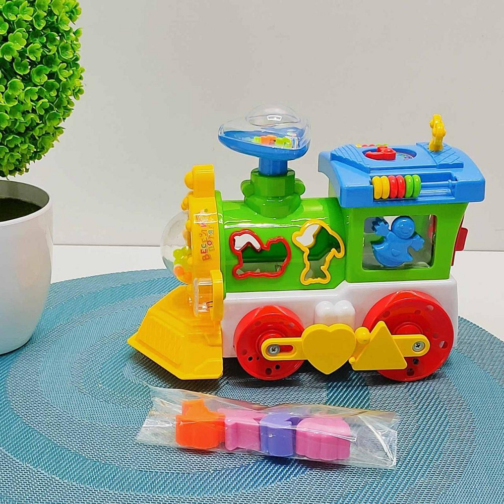 Паровоз розвиваючий TK Group озвучка на батарейках пищалка на трубі підсвічування Зелено-синій (93866) Чернігів - фото 1