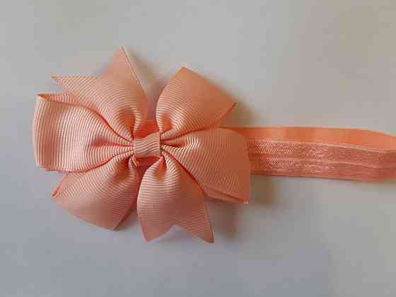 Дитяча персикова пов'язка З дефектом - на резинці, окружність від 30см до 48см, бант 9см Київ