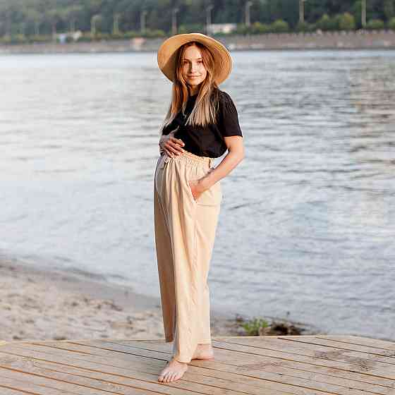 Широкі штани для вагітних з легкої тканини Бежеві Київ