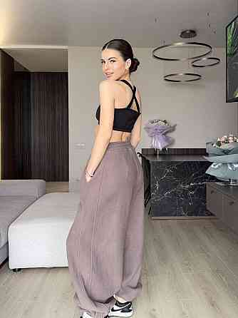 Женские теплые объемные брюки 