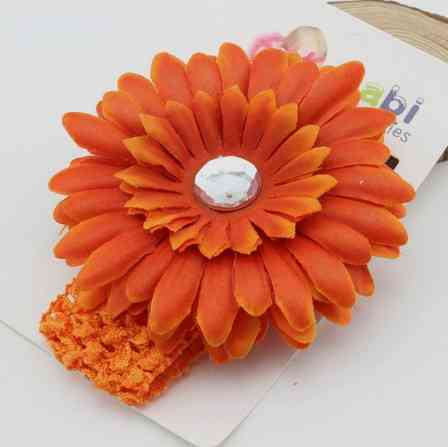 Помаранчева дитяча пов'язка з квіткою - розмір універсальний (на резинці), квітка 11см Київ