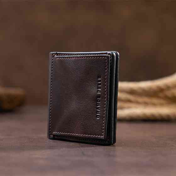 Вертикальне глянсове портмоне з накладною монетницьою GRANDE PELLE 11330 Шоколадне Київ