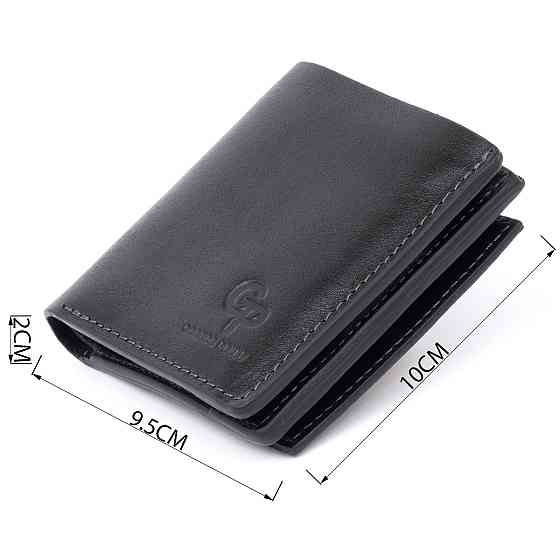 Вертикальное глянцевое портмоне с накладной монетницей GRANDE PELLE 11329 Черное Киев