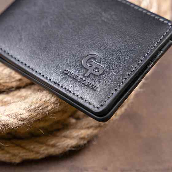 Стильне портмоне з затискачем для грошей без застібки GRANDE PELLE 11295 Чорне Київ