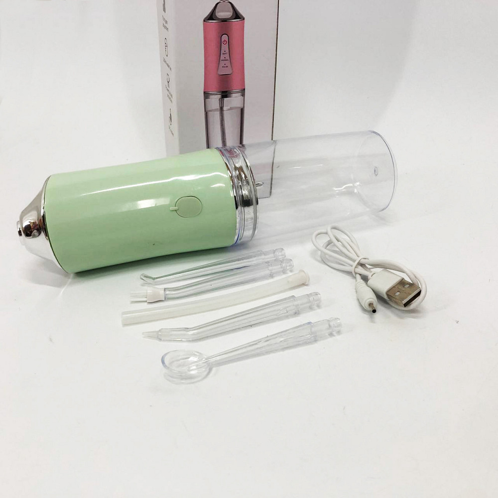 Ирригатор для чистки зубов и полости рта Oral Irrigator с аккумулятором и сменными насадками. Цвет: зеленый VD-91 Львов - изображение 2