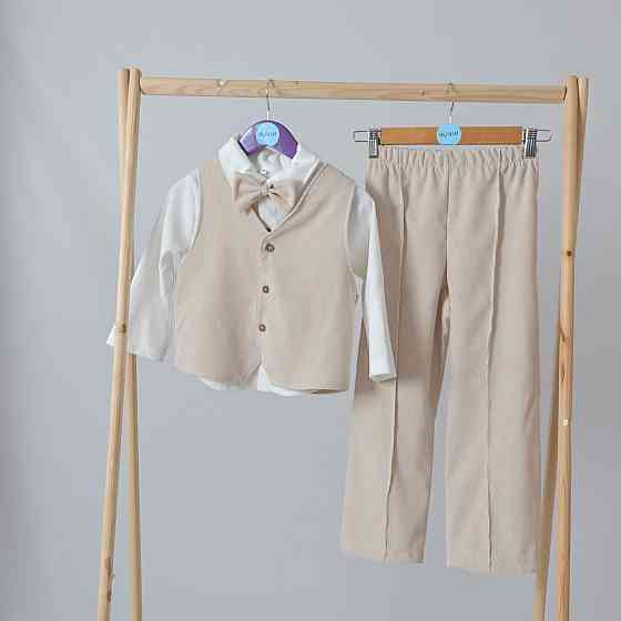 Дитячий святковий костюм для хлопчика (жилетка + штани + сорочка + бабочка) Білий БежевийMROU 134 Кам'янець-Подільський