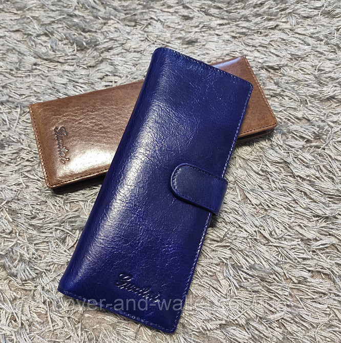 Містка жіноча шкіряна кредитниця на багато карток синього кольору Guxilai Київ - фото 1