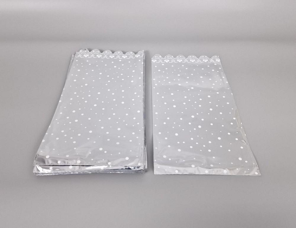 Пакет із малюнком для пакування подарунків (20*40) No151 фольгований (ажурний) "Конфеті" (100 шт) Харків - фото 1