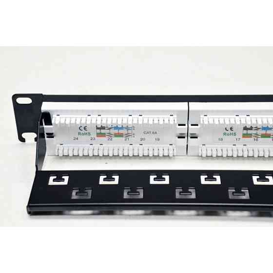 Патч-панель CMS 19" 24xRJ-45 UTP, кат. 6a з організатором кабелю і пластиковими шторками Київ