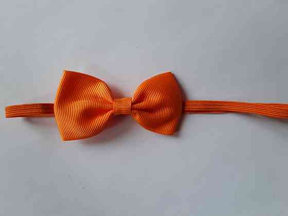 Дитяча повязочка на голову помаранчева - розмір універсальний (на резинці), бантик 7см Київ