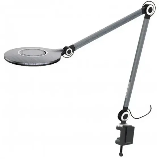 Кругла LED-лампа на струбцині. Чорний Київ