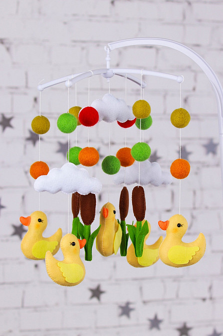 Дитячий музичний мобіль на ліжечко для немовлят WooolyWool «Каченята» з 35 мелодіями (М017) Київ - фото 1