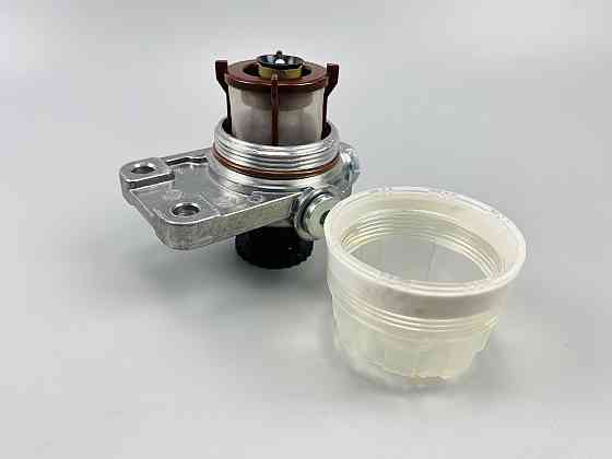 Фільтр очищення палива з прокачуванням (універсальний), кріплення горизонтальне. Усередині змінний елемент (сітка) Мукачево