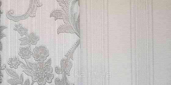 Обои виниловые на флизелине AdaWall Seyyah 1.06х10 вензеля завитки крупные структурные серебро на серо белом Киев