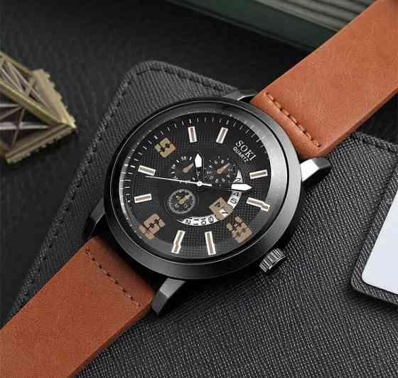 Подарочный набор для мужчин: наручные часы с 3 ориг. браслетами- диам 4см, длин 24см, шир рем 2см, без коробки Киев