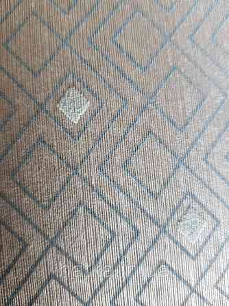 Текстильні шпалери на флізеліновій основі Cador Rasch Textil 086606 бежева основа ромби геометрія блакитні Київ