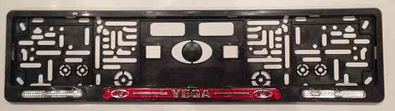 Рамка номерного знака хром напис Vega (Лада) пластик чорна 2 шт. Київ