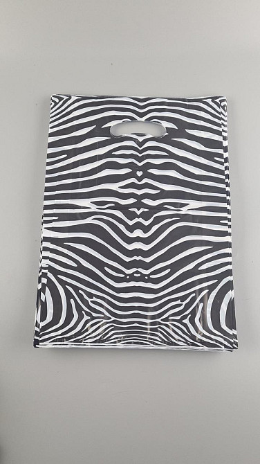 Пакети з вирубаною ручкою (28*40) "ЗЕБРА" Комсерв (100 шт.) Харків - фото 3