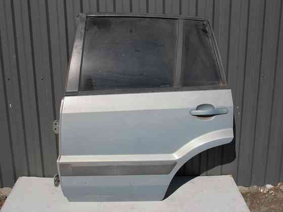 Двері задні ліва Ford Fusion 2002-2006 Ковель