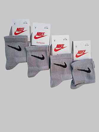 Дитячі якісні бавовняні шкарпетки Сірого кольору середньої висоти в наборі 4 штук Nike. Розмір 31-34 Київ