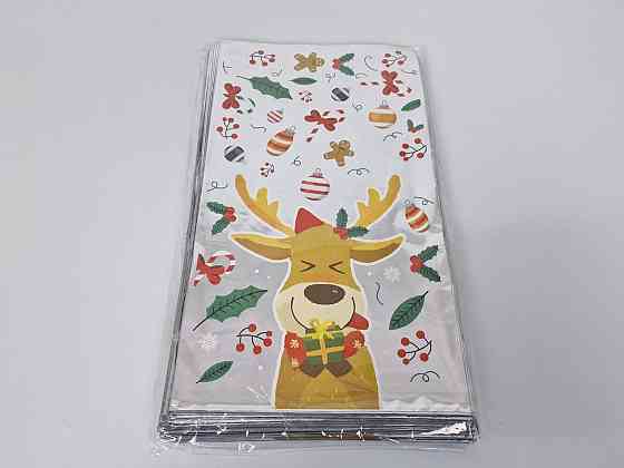 Подарочная упаковка с новогодним рисунком (20*35) №27 Олень (100 шт) Харьков