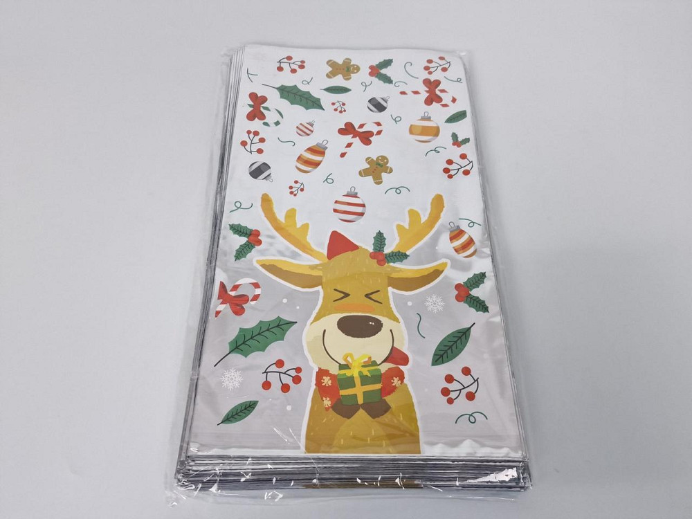 Подарункова упаковка з новорічним малюнком (20*35) No27 Олень (100 шт.) Харків - фото 1