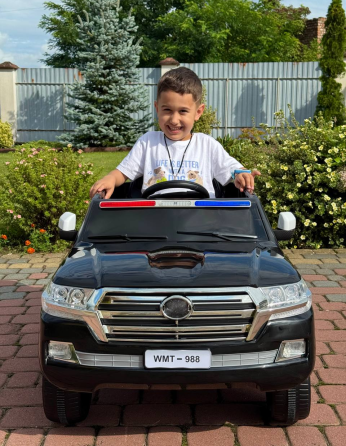 Детский электромобиль Полицейский внедорожник (MP3, USB, качание, музыка, пульт, открывание дверцы, LED-свет) Киев