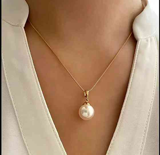 Набор украшений с жемчужинами: серьги-подвески и ожерелье золотого цвета Киев