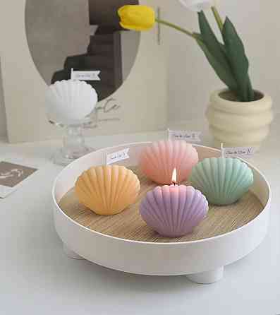 Свеча “Морская ракушка” ручной работы фиолетового цвета Каменец-Подольский