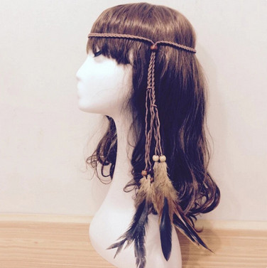 Пов'язка для волосся жіноча з пір'ям Київ - фото 1