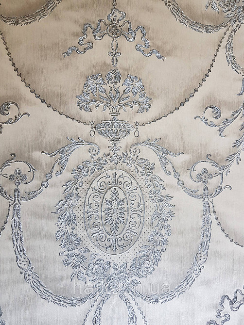 Шпалери вінілові на флізеліні Rasch Trianon Xlll 0.53х10 класика структурні вензелю розетки срібло на бежевому Київ - фото 3