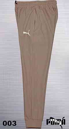 Чоловічі завужені штани під манжет Puma, тканина лакоста new Tech knit Київ