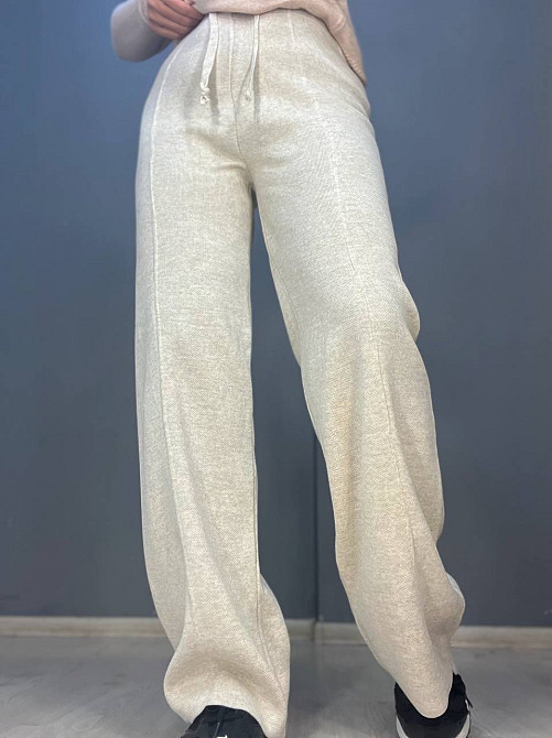 Брюки женские My fashion 202401 клеш от бедра со стрелкой шнурок га талии машинная вязка one size, світло-бежевый, one size Киев - изображение 11