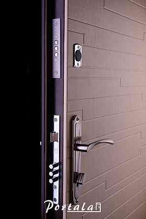 Двери квартирные, серия Комфорт, модель Эстепона, на трубе венге темный/венге светлый, 2 замка Киев