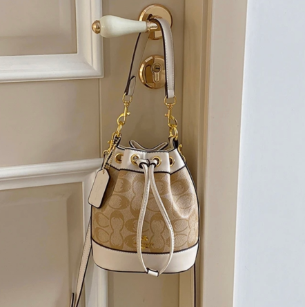 Женская сумка из фирменного холста с подвеской сердце (Бежевая) Киев