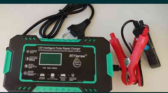 Автомобильное зарядное устройство.Імпульсний зарядний пристрій RJ Киев