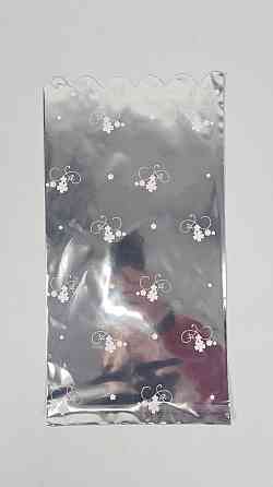 Пакет із малюнком для пакування подарунків (20*40) No153 фольгований (ажурний) "Квітковий розпис" (100 шт.) Харків