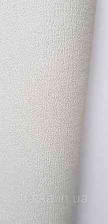 Шпалери вінілові на флізеліні A.S.Creation UNITA 1.06x10 однотонні матові структурні світло-зелені Київ