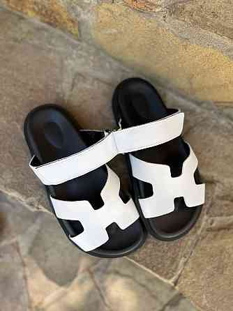 Notta bene Шльопанці жіночі, натуральна шкіра, на плоскій чорній підошві білі Notta bene TS-022 Коломия