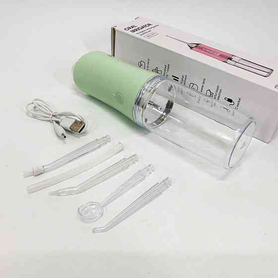 Ирригатор для чистки зубов и полости рта Oral Irrigator с аккумулятором и сменными насадками. Цвет: зеленый IH-24 Львов