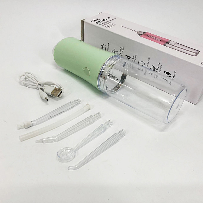 Ирригатор для чистки зубов и полости рта Oral Irrigator с аккумулятором и сменными насадками. Цвет: зеленый IH-24 Львов - изображение 5