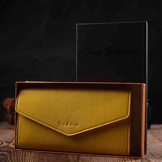 Яскраве жіноче велике портмоне з натуральної шкіри Жовтий (Tony Bellucci) Київ